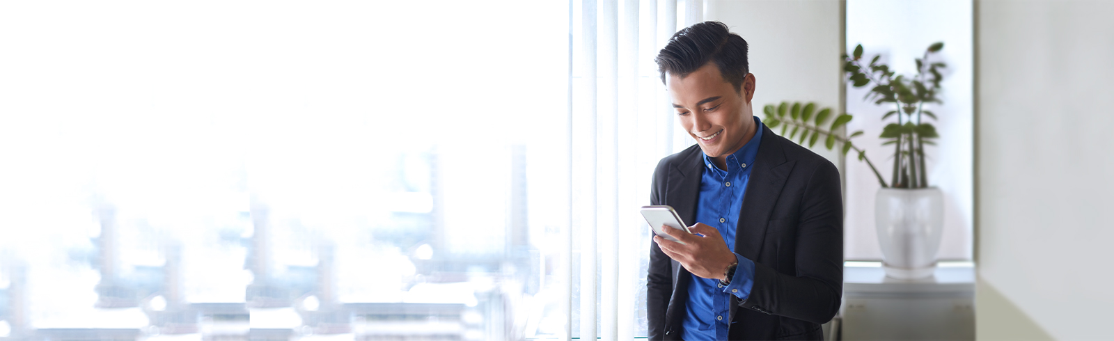 A gentleman is checking his phone