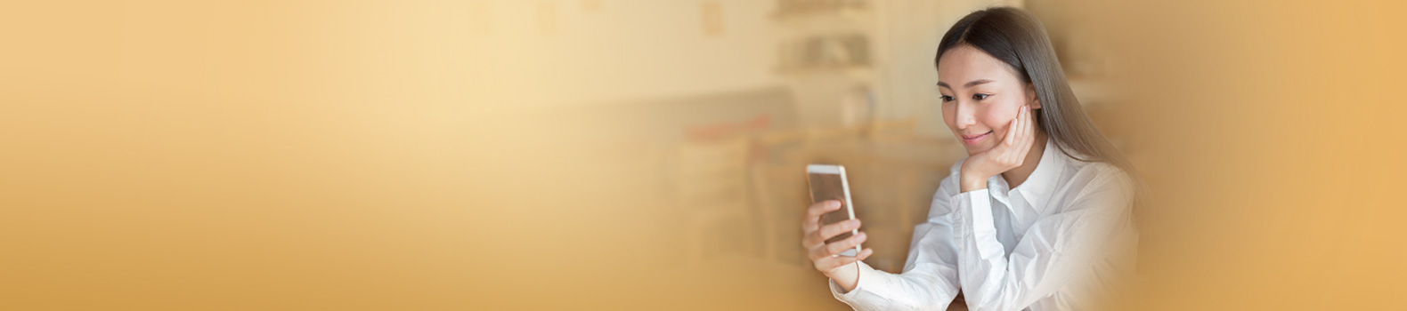 a lady in white shirt is using mobile phone to receive SMS and email alerts