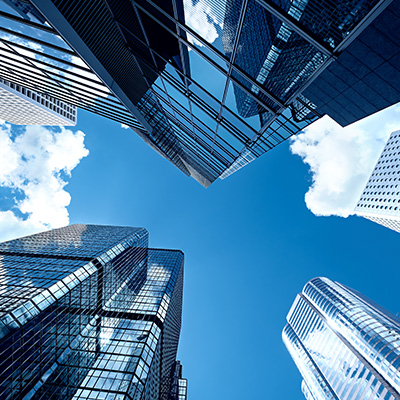 Looking up to the sky in the middle of skyscrapers