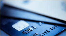 stack of credit cards, with a cold color tone