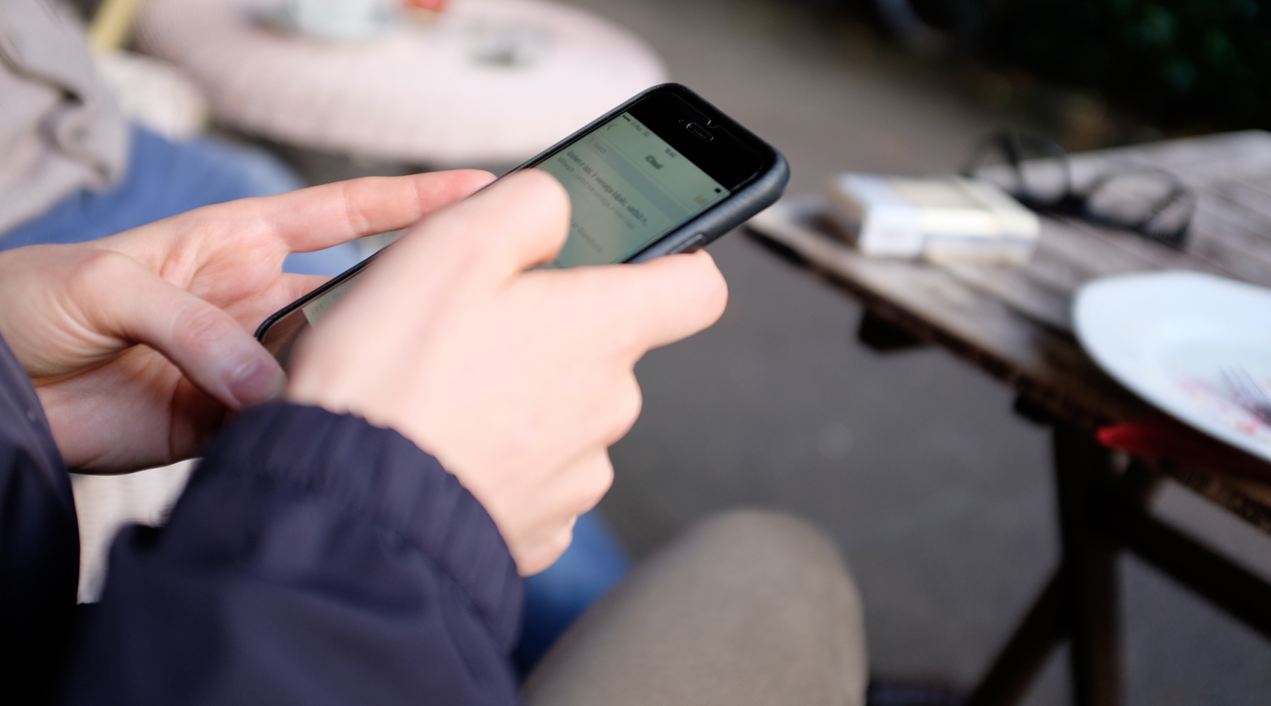 Using mobile phone in a cafe httpbarnimagescom