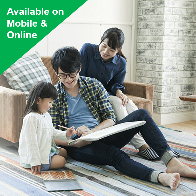 A man is reading a book to a little girl and a woman is laughing at their back