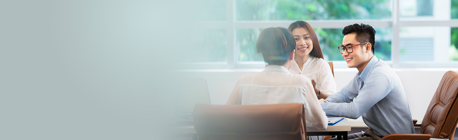 a group of people discussing mpf planning in a meeting area